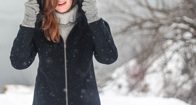 Woman standing outside in the cold