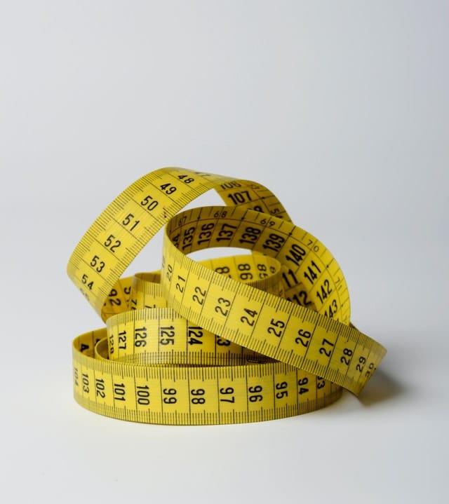 close-up-photo-of-yellow-tape-measure