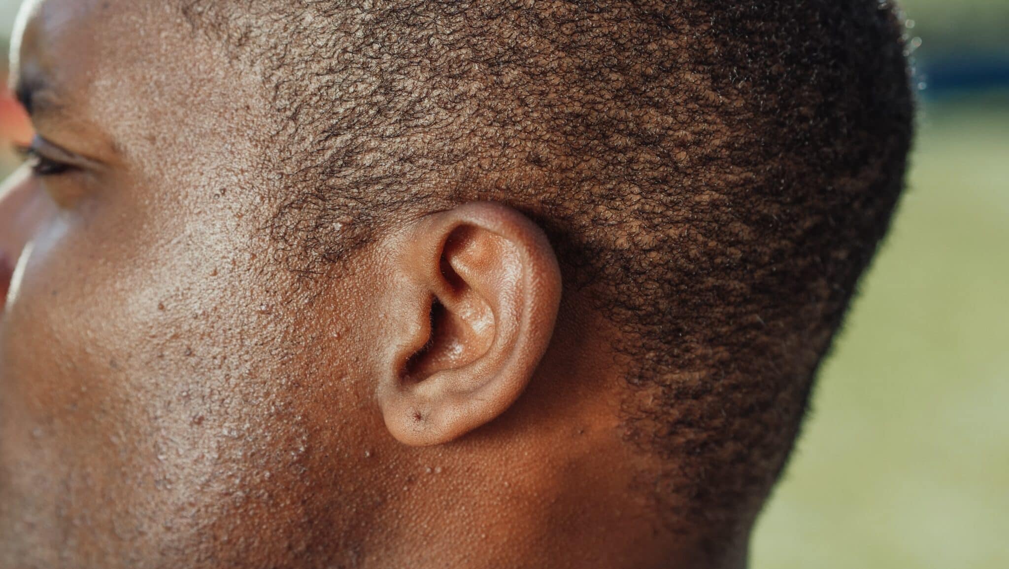 Close up of a man's ear.