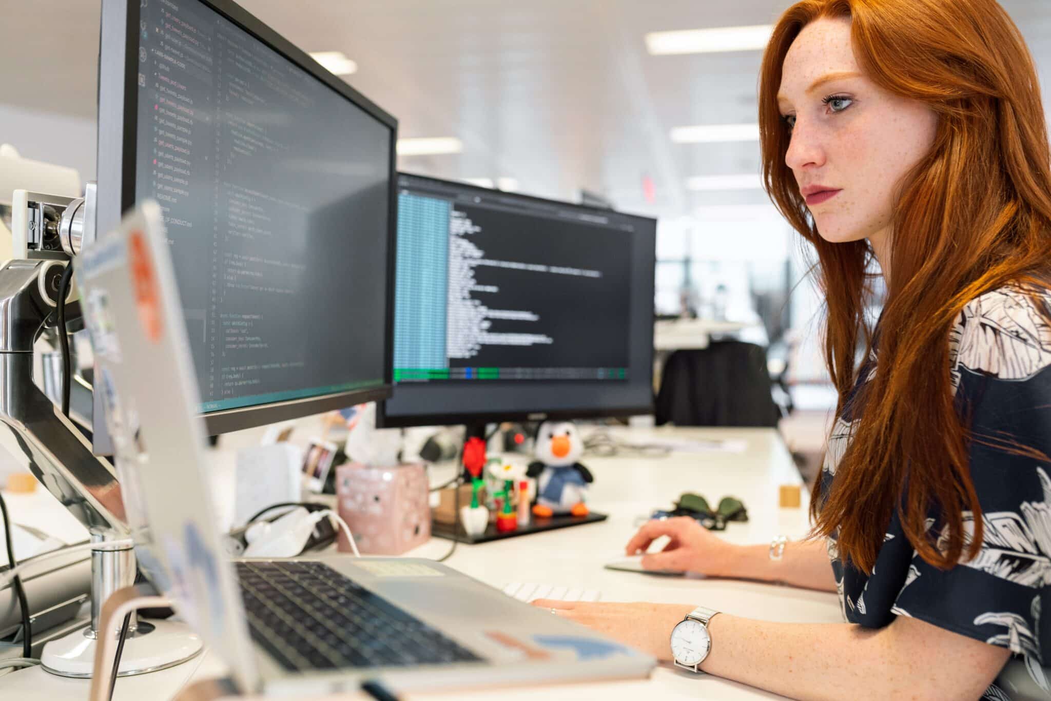 Woman working on a computer at work.