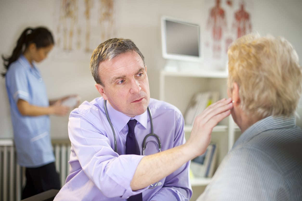 Woman gets ear examined